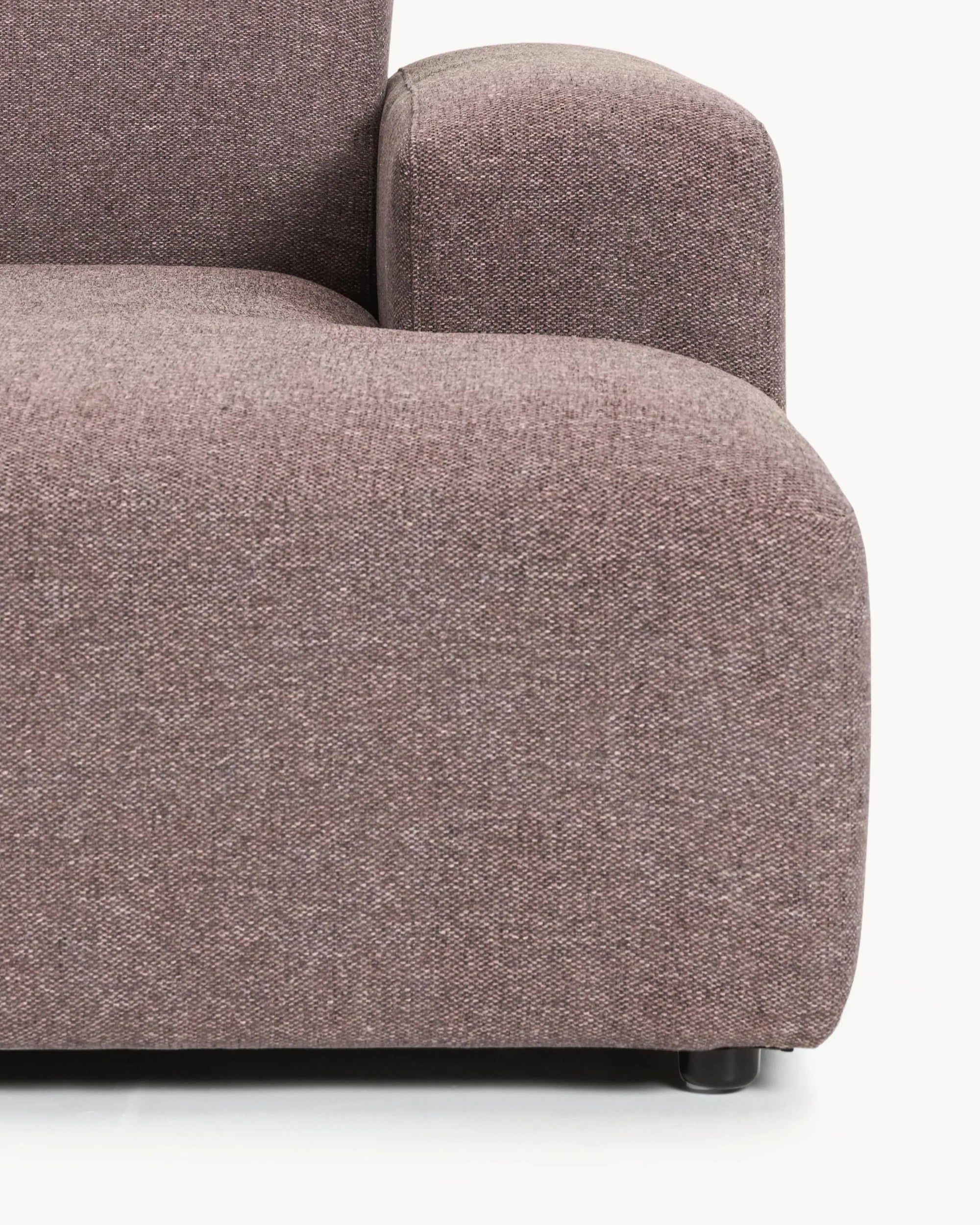 Close-up view of Moodi Mini Uzanmalı stylish and modern sofa in soft brown fabric.